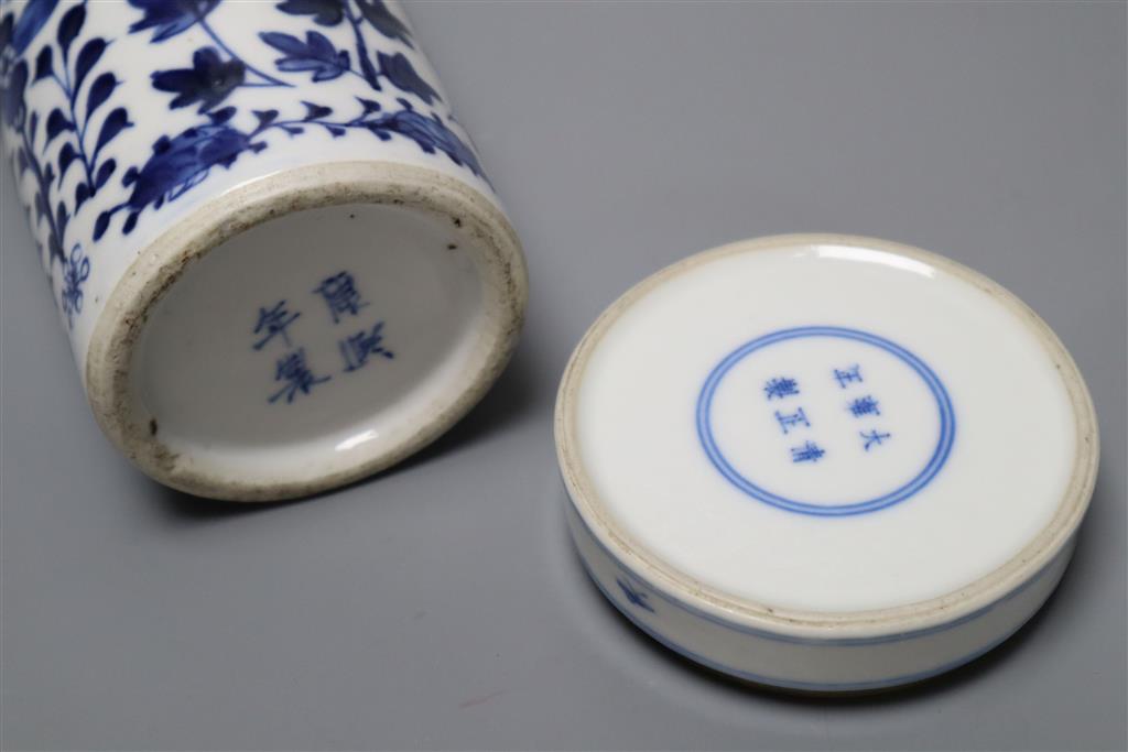 A Chinese blue and white seal paste box and cover, Yongzheng mark but 19th century, and a blue and white cylindrical dragon sleeve vase